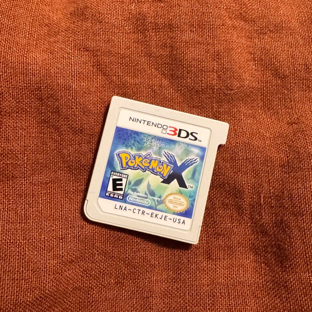 Nintendo 3DS Pokémon X Game Cartridge with Blue and White Design